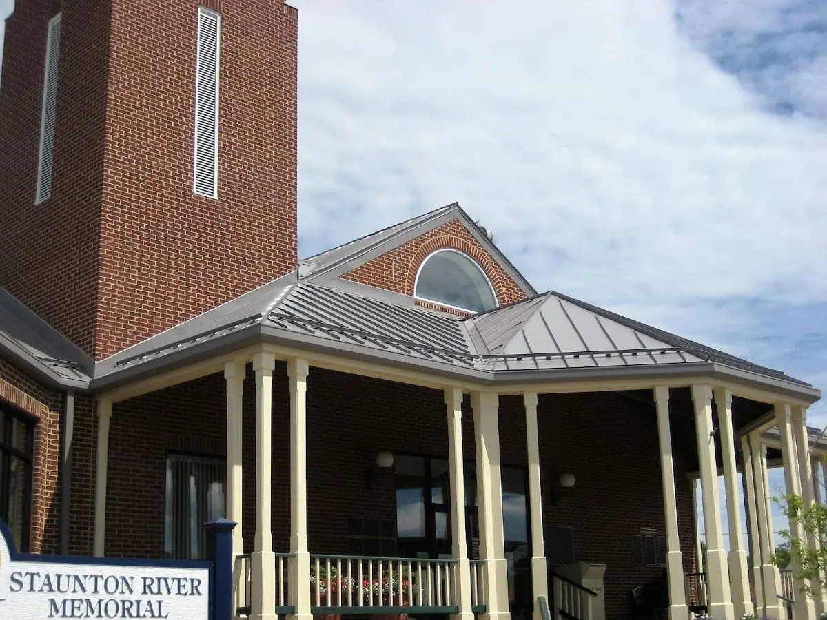 Skilled roofing craftsmen working on a residential roof in Loganville
